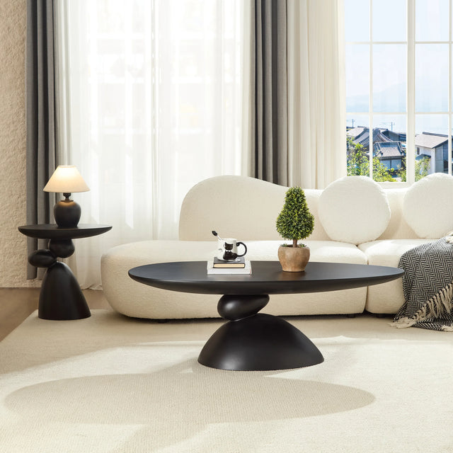 Minimalist Black Fiberglass Lucky Stone Oval Coffee Table - Omega Lifestyles