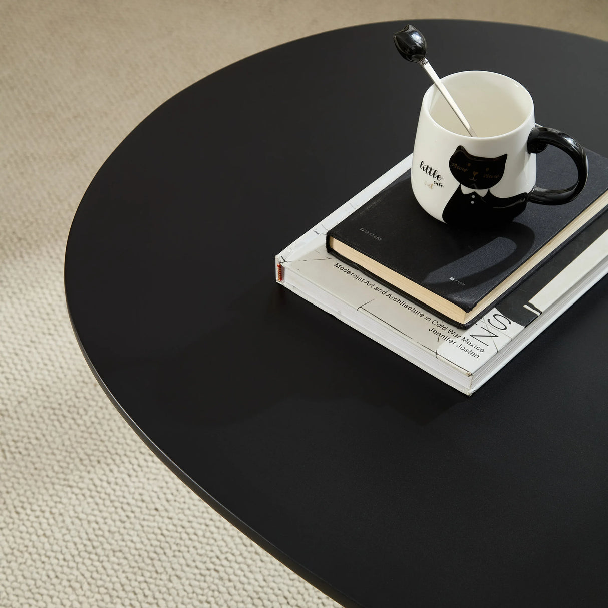 Minimalist Black Fiberglass Lucky Stone Oval Coffee Table - Omega Lifestyles